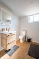 Immaculate bathroom hardwood vanity