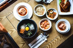 Probiotics, kimchi, wooden table