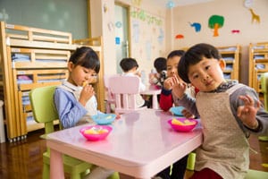 Toddler eating day care classroom