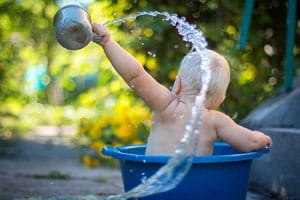 Baby boy bath foreskin care