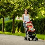 mom-walking-baby-summertime