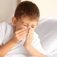 boy in bed with whooping cough thumbnail