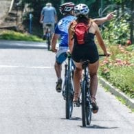 family riding bike to health their mind and body