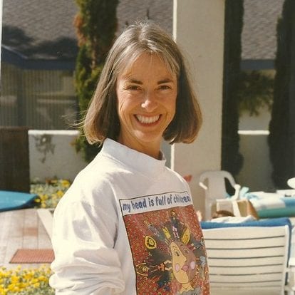 an old image of martha sears outside in her sweatshirt