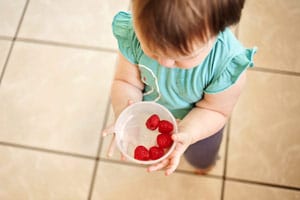 Toddler raspberries tile floor