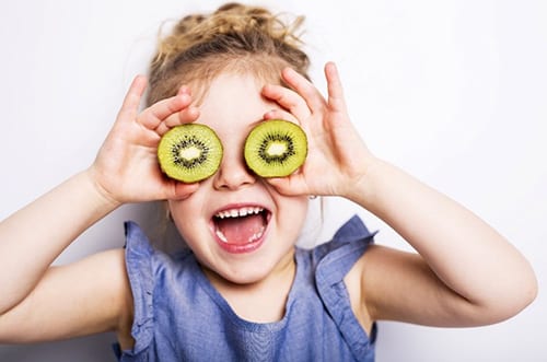 Girl with kiwi glasses