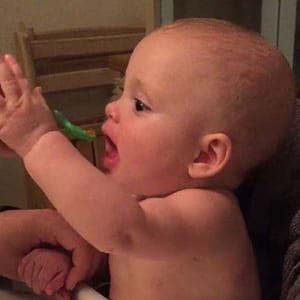 baby eating salmon at seven months old