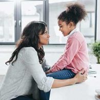 mother talking to child to alleviate fear of coronavirus