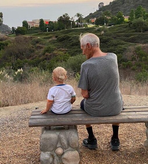 Dr.Bill enjoying the view with the newest grandson, Johnny.